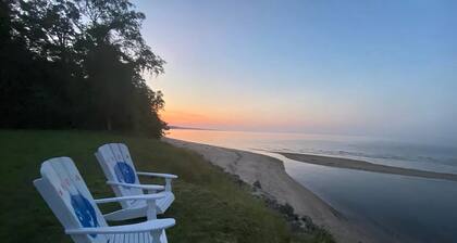 Cozy Cottage with access to and partially obstructed views of the bay.