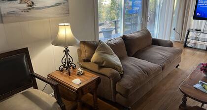 Cozy Cottage with access to and partially obstructed views of the bay.