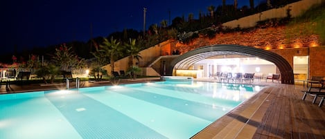 Indoor pool, outdoor pool, free pool cabanas, pool umbrellas