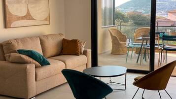 Superior Apartment | Living area | Smart TV