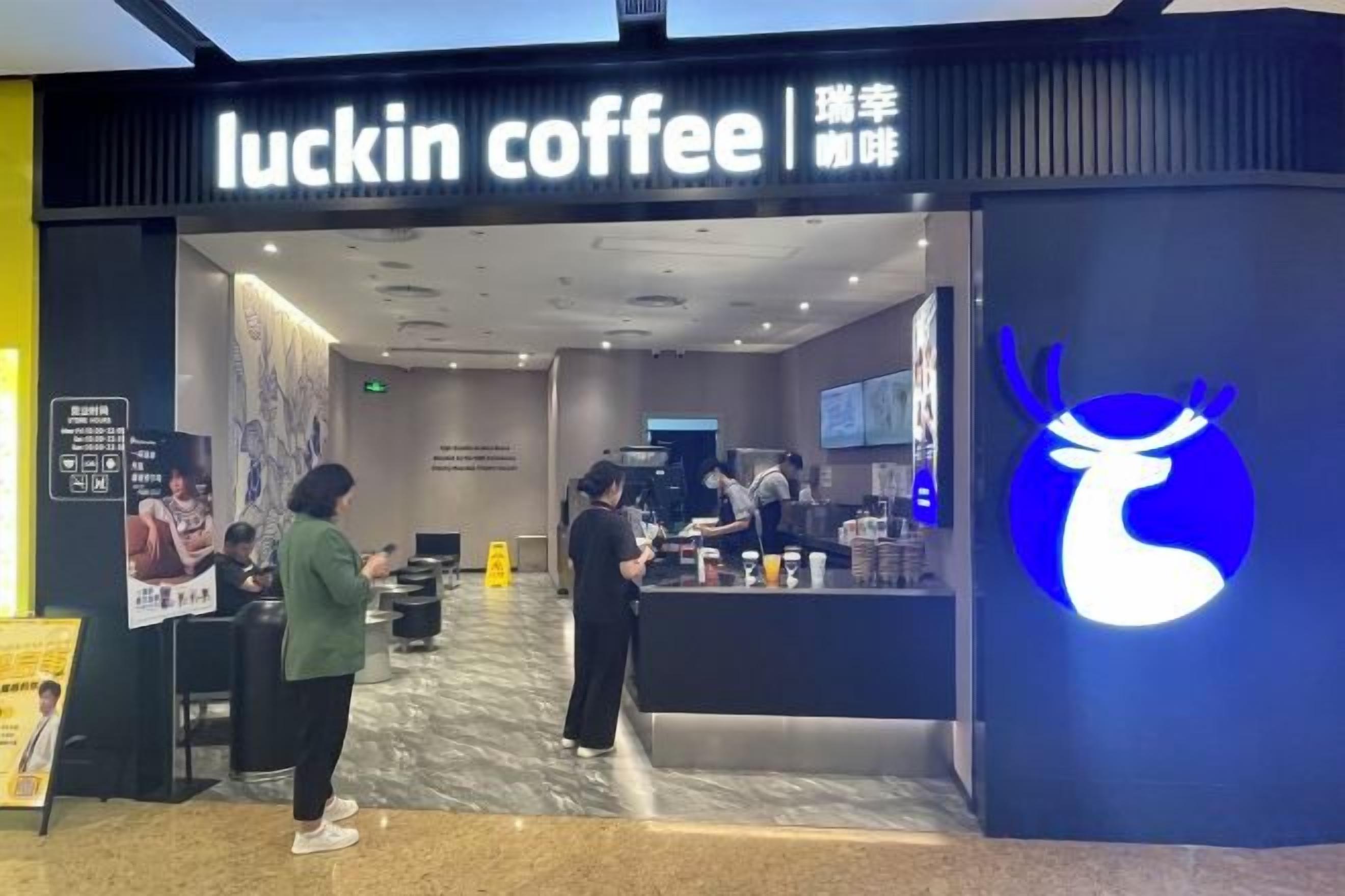 A coffee shop named 'luckin coffee' with a modern interior and a logo featuring a stylized deer.