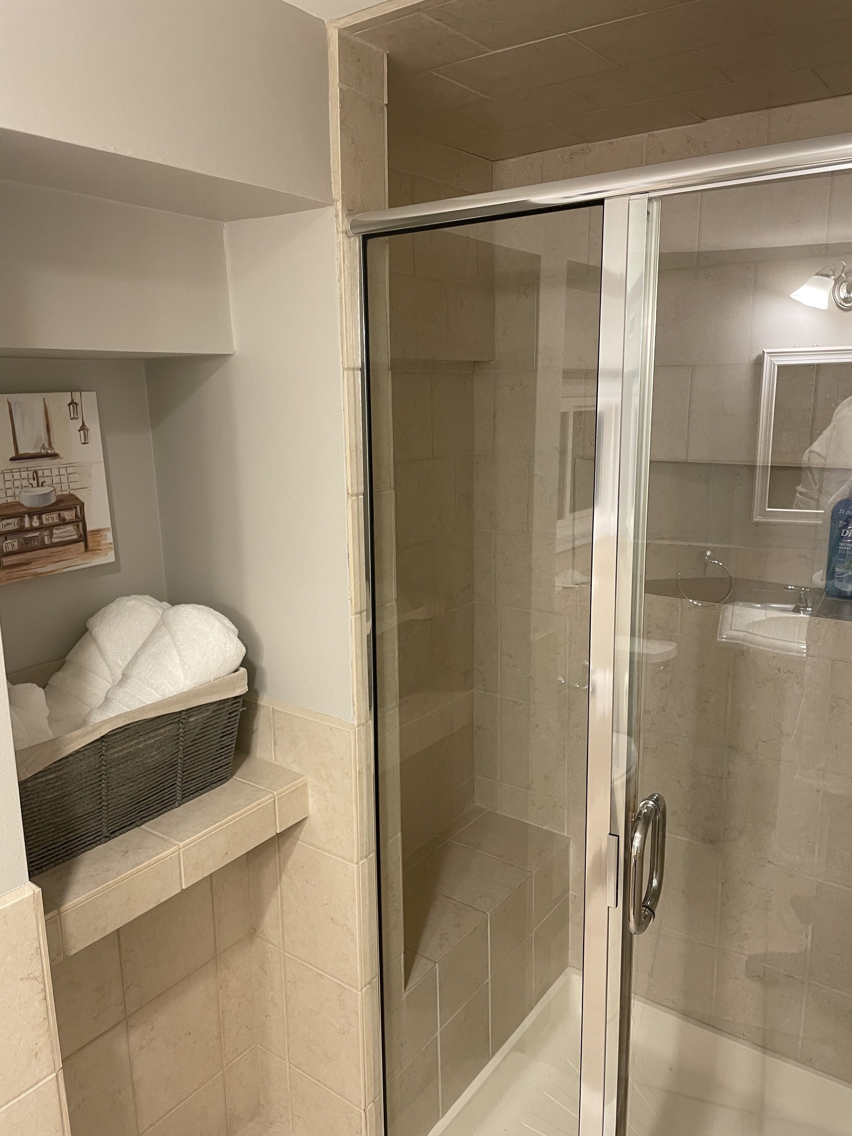 Combined shower/bathtub, hair dryer, towels, soap