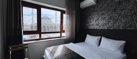 Deluxe Quadruple Room, City View