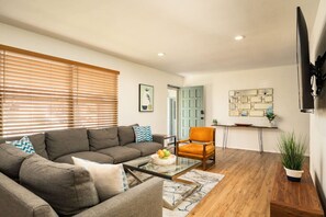 TV, fireplace, books