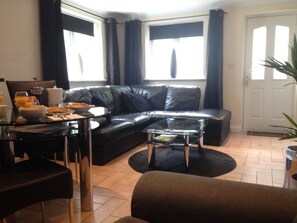 Departamento Deluxe | Área de sala de estar