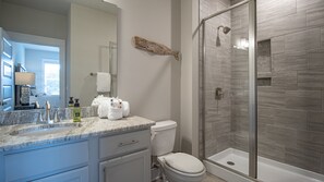 Bathtub, hair dryer, towels, soap