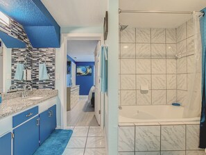 Combined shower/tub, towels, soap, shampoo