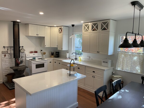 Fridge, microwave, oven, stovetop - Quaint two bedroom residential home with wood stove (Murphys)