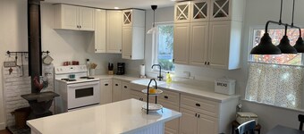 Quaint two bedroom residential home with wood stove