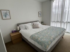 2 bedrooms, desk, blackout drapes, iron/ironing board