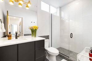 Bathtub, hair dryer, towels