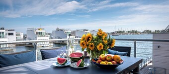 The houseboat is located on the ground floor and features a Finnish sauna.