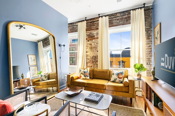 TV, fireplace, offices - The Manhattan | Sip Back and Relax (Charleston)
