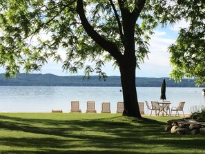 Outdoor dining - Beautiful Big Glen Lake Beach Home (Glen Lake)