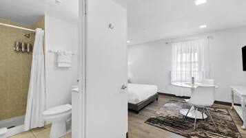 Standard Studio | Bathroom | Shower, hair dryer, towels, soap