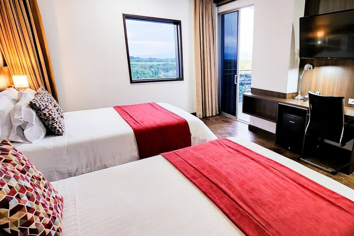 Premium bedding, down comforters, pillowtop beds, in-room safe