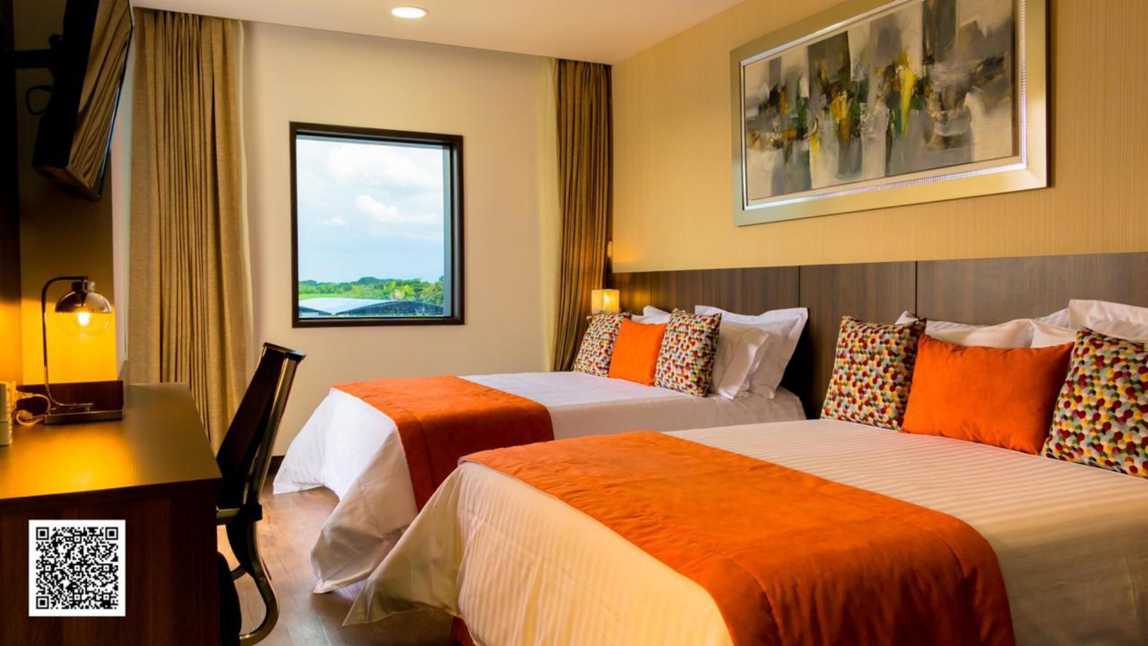 Premium bedding, down duvets, pillow-top beds, in-room safe