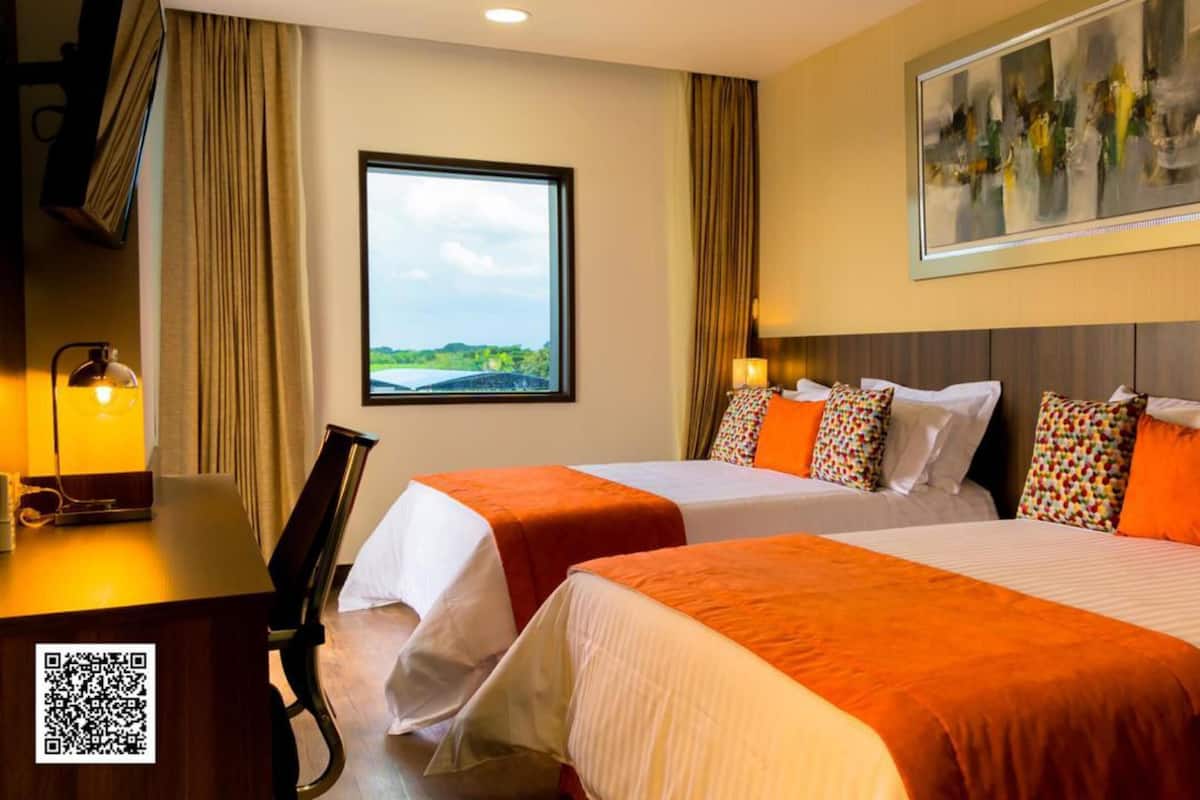 Premium bedding, down duvets, pillow-top beds, in-room safe