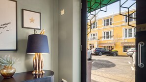 A modern interior with a dark blue cabinet, a lamp, and a framed picture on the wall. - Apartment 293 - Clifden - sleeps 4 guests  in 2 bedrooms (Clifden)