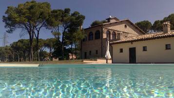 Seasonal outdoor pool, pool umbrellas, sun loungers