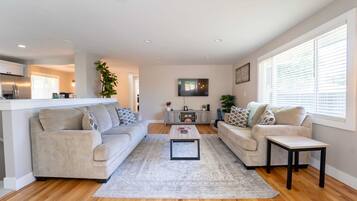 TV, fireplace, books, offices
