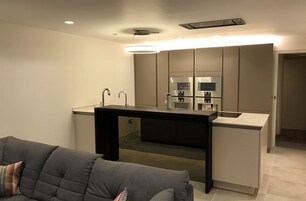 Deluxe Apartment | Living area | 40-inch Smart TV with digital channels, TV, Netflix