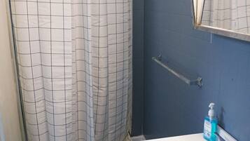 Shower, towels, soap, toilet paper