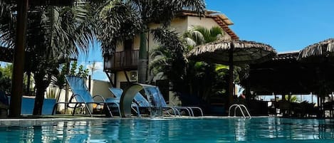 2 outdoor pools, open 7:00 AM to 10:00 PM, pool umbrellas, sun loungers