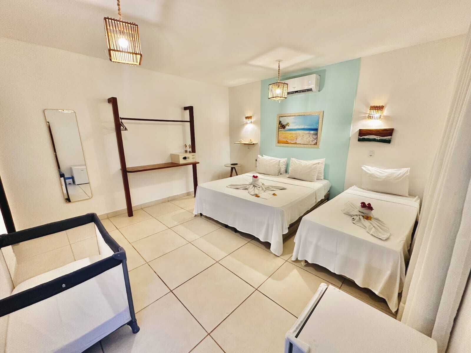 Quarto triplo conforto | Cofres nos quartos, cortinas blackout, Wi-Fi de cortesia, roupa de cama