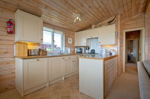 Fridge, microwave, dishwasher, high chair