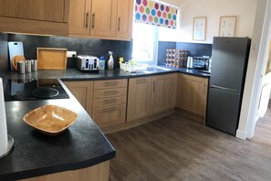 Fridge, microwave, dishwasher, high chair