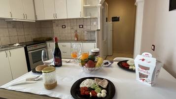 Panoramic Condo | Private kitchen | Full-size fridge, oven, stovetop, dishwasher