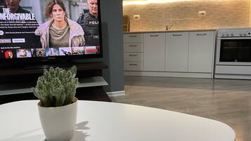 Comfort Apartment | Living area | 32-inch LCD TV with cable channels, TV