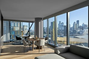 Signature Suite, 1 King Bed, Non Smoking, City View | Premium bedding, laptop workspace, iron/ironing board