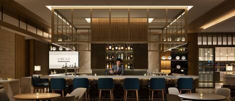 Eine moderne Bar mit Bartender, Barhocker und freundlicher Beleuchtung.