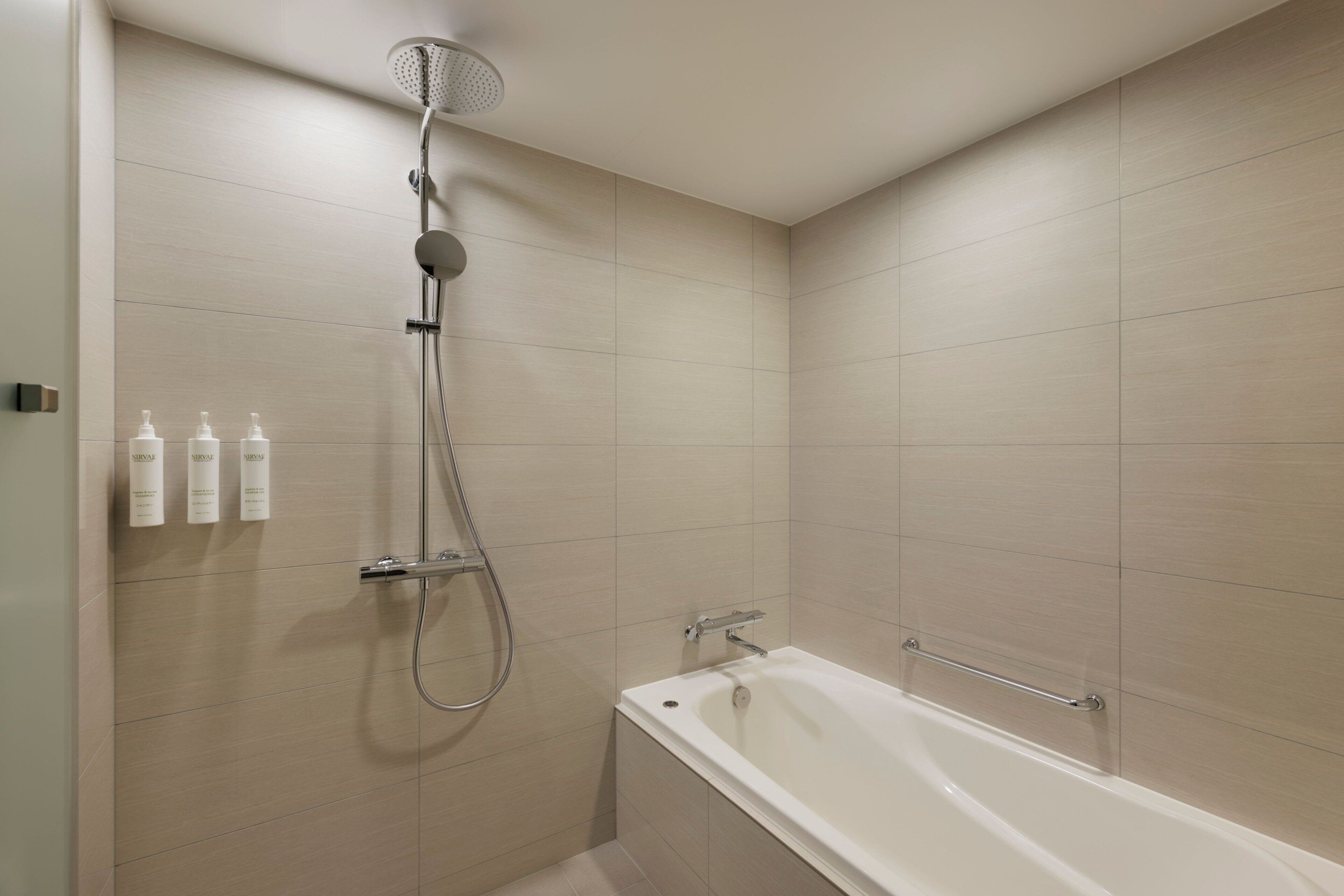 suite, 1 king bed, non smoking, corner | bathroom | free toiletries, hair dryer, slippers, electronic bidet