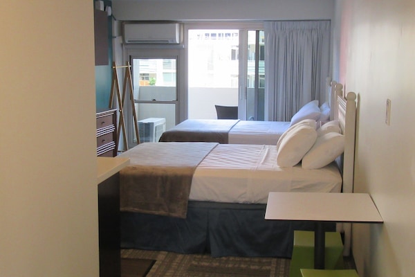 Standard Room, 2 Queen Beds | In-room safe, free WiFi