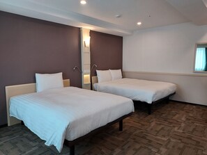 Family Twin Room, Multiple Beds, Non Smoking | In-room safe, desk, laptop workspace, blackout drapes