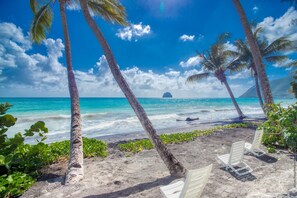 On the beach, sun-loungers, beach towels