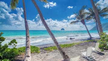 On the beach, sun-loungers, beach towels