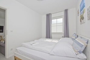 1 bedroom, WiFi - Modern vacation apartment with private terrace - Haus Inselwind FeWo MEERküste - (Gager)