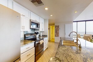 Fridge, microwave, oven, stovetop - Corner condo with amazing views, wraparound balcony, & pools - minutes to beach (South Padre Island)