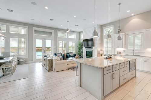 Waterfront paradise with private pool, dock, poolside TV & multi-TV game room