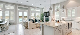 Waterfront paradise with private pool, dock, poolside TV & multi-TV game room