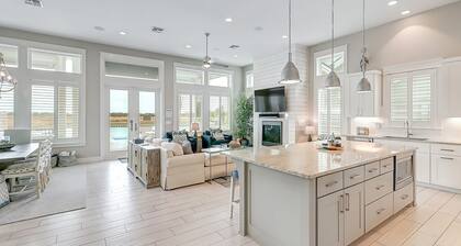 Waterfront paradise with private pool, dock, poolside TV & multi-TV game room