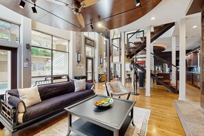 TV, fireplace, books