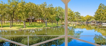 Lakefront dog-friendly home with kayaks, SUP’s, huge screened porch