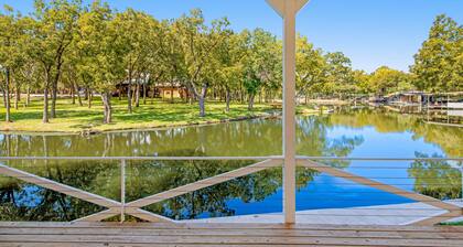 Lakefront dog-friendly home with kayaks, SUP’s, huge screened porch