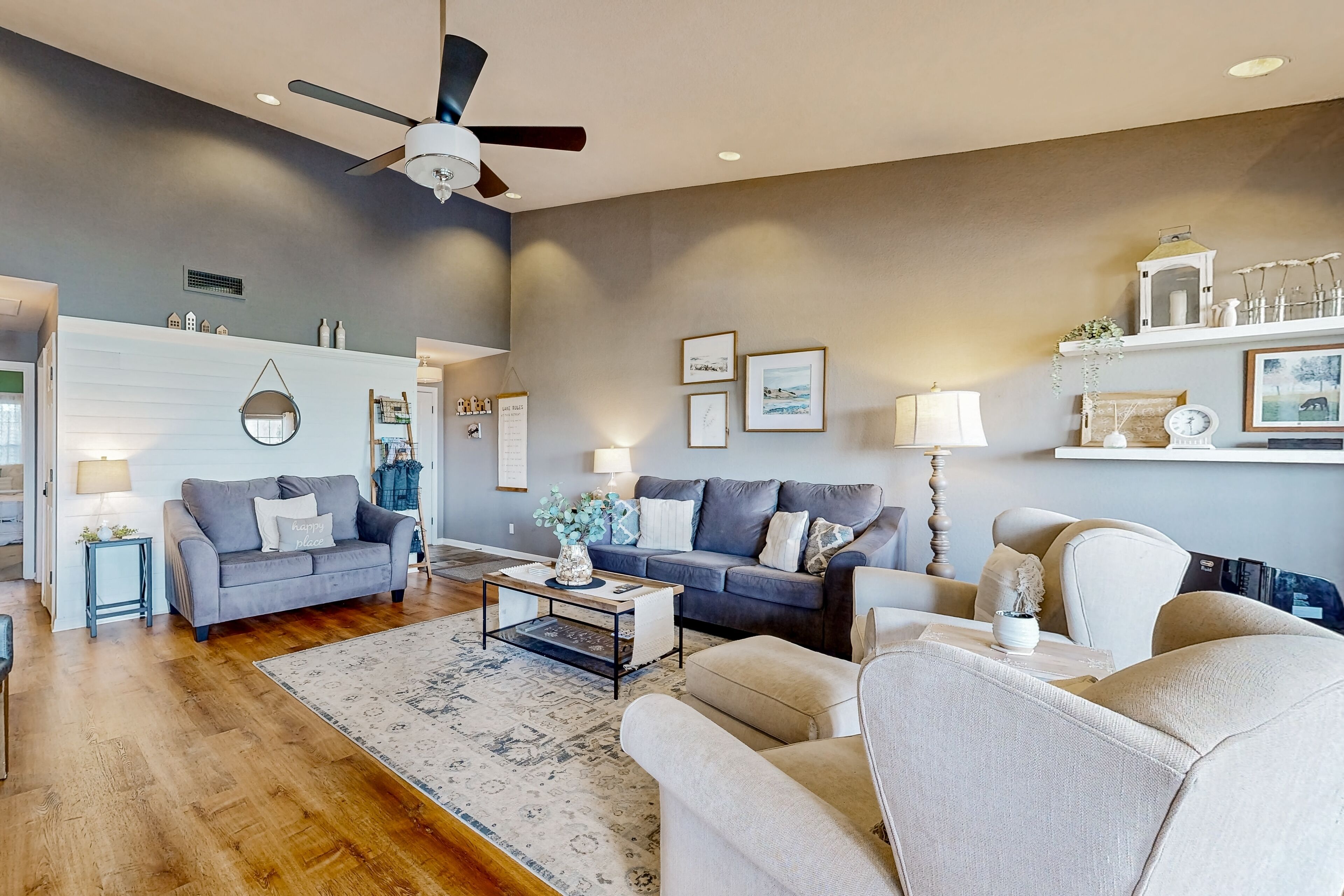 Lavish lakefront retreat in private island community with pools, tennis, & gym