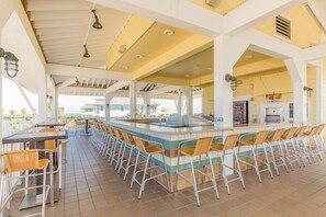 Outdoor dining - Pointe West getaway with pool, hot tub & bay-view balcony - walk to beach (Galveston)